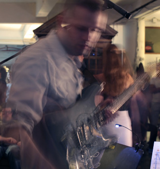 Bosley warming up on guitar for W4's End of Summer II